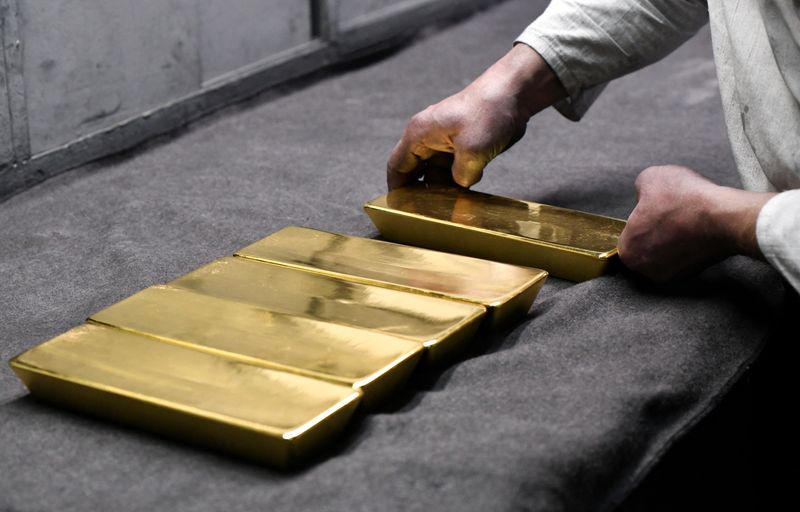 PBOC halts gold buying spree, prices drop over $50/oz