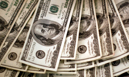 Dollar slips against dong