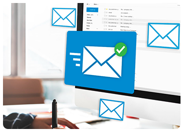 A person using a pen near a computer screen displaying a digital email interface with multiple email icons and a prominent email graphic with a check mark.