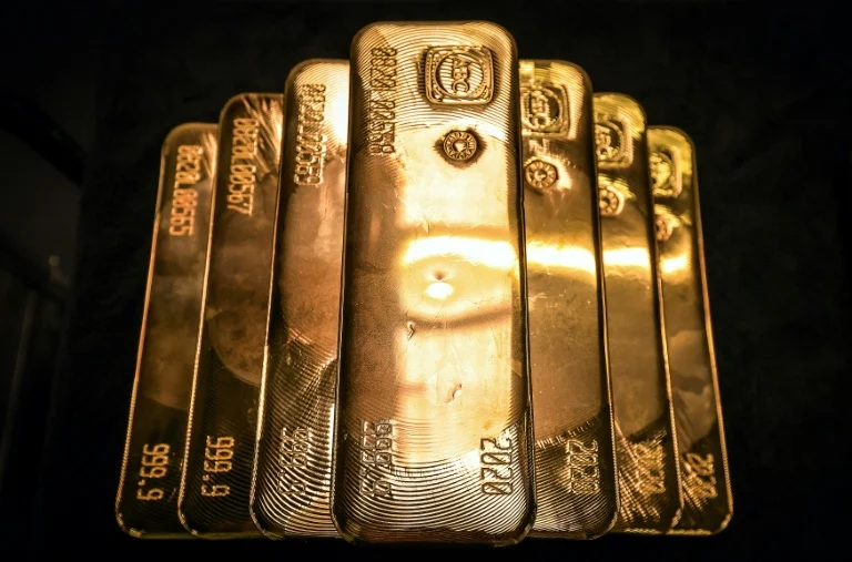 Gold, silver hit records and stocks fall as Trump fans trade fears
