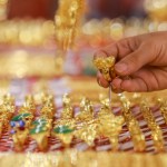 Gold prices drop to 4-month bottom