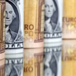 Dollar inches down against dong on black market