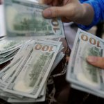 Dollar climbs against dong on black market