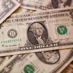 Dollar falls marginally against dong