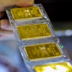 Gold prices decline marginally