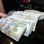 Dollar steadies as markets await Warsh at Jackson Hole