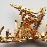 Gold heads for third weekly gain on weaker dollar