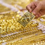 Gold prices gain