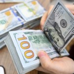Vietnam central bank sets record exchange rate against dollar